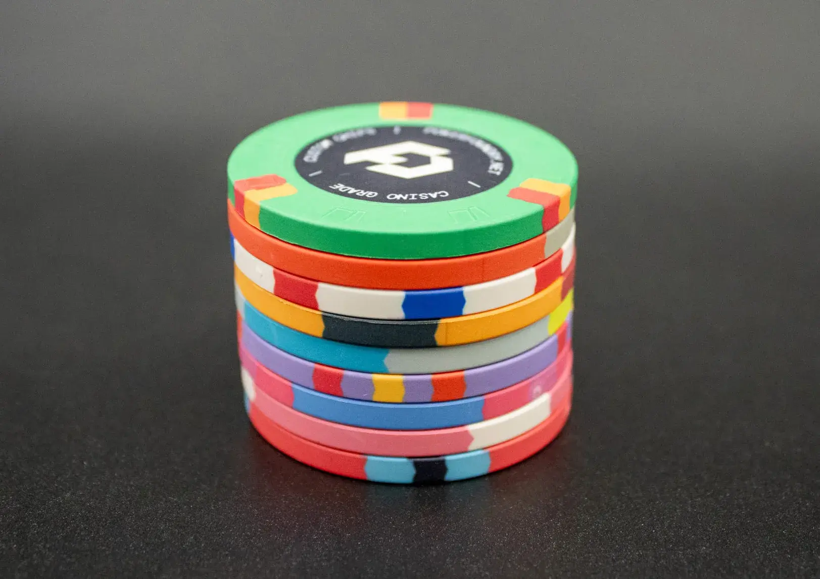Bespoke ceramic chips with flat edge, contemporary stack profile, and bold custom centre design