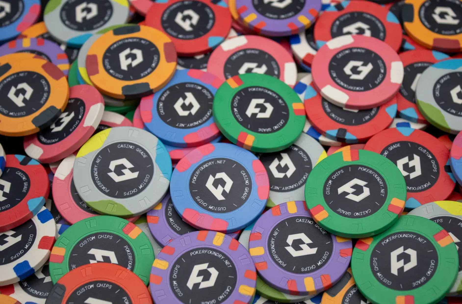 Custom ceramic chips with smooth matte finish and edge-to-edge printed design without a separate inlay label